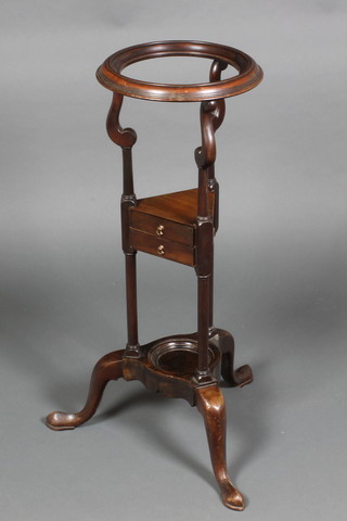 A 19th Century mahogany wig stand/wash stand fitted bowl receptical, the base fitted 2 drawers with triform base and splayed feet 31"h x 11 1/2"w