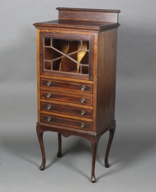 An Edwardian inlaid mahogany music cabinet with raised back, the upper section enclosed by an astragal glazed panelled door, the base fitted 4 long drawers raised on cabriole supports 51"h x 22"w x 15"d 