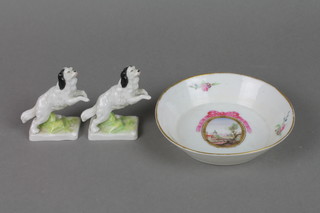 A 19th Century Continental saucer decorated with a landscape view 4", a pair of Continental figures of dogs 10" etc