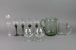 A 19th Century Continental wine flute, 4 wines, a water jug and 3 other items