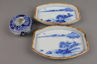 2 early 20th Century Chinese blue and white lozenge shaped dishes with landscape views 7", a ditto ink pot with pierced decoration 3"