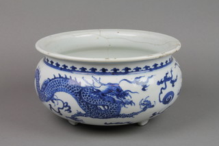A 19th Century Chinese baluster jardiniere decorated with dragons chasing the flaming pearl, raised on 3 legs 9" f, 