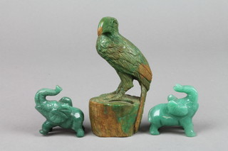 A Jadite figure of a bird on rocky base 4", 2 ditto elephants 2"