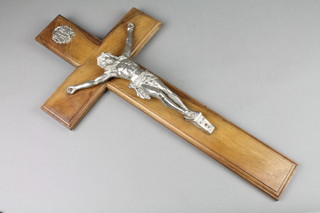 An olive wood crucifix with metal corpus christi 23"