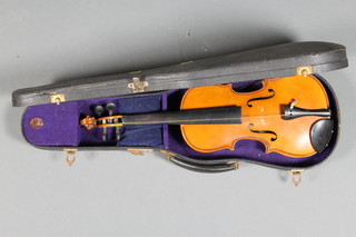 A childs Piena student violin 