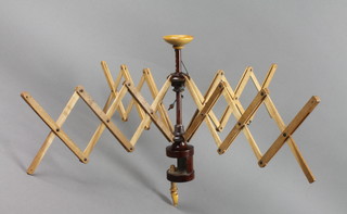 A Victorian turned wooden wool winder