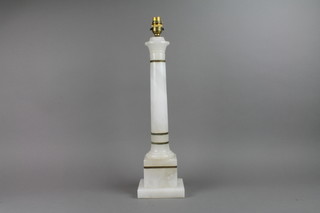 An Art Deco alabaster table lamp in the form of a column raised on a square stepped base 17 1/2" 