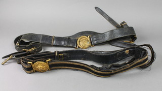 A George V issue Royal Naval Reserve Officer's sword belt together with a Continental Naval Officer's sword belt