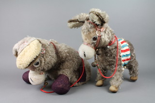 A Merrythought pyjama case in the form of a seated donkey 10" and a ditto figure of a donkey 13"