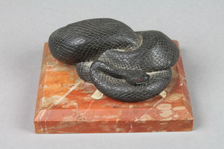 A Victorian bronze and pink veined marble paperweight in the form of a curled snake 5"