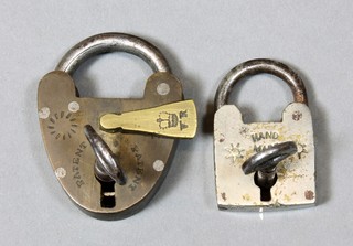 A Victorian miniature brass heart shaped padlock marked Patented 1", together with a square steel padlock marked Handmade