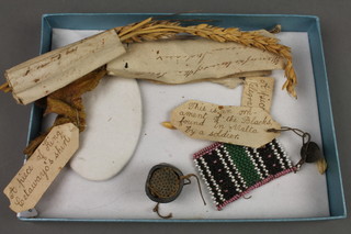 Two ears of corn removed from the field of the Battle of Waterloo 1838, a section of King Getawayo's shirt and other curios