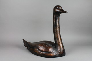 A 20th Century bronze figure of a swan set glass eyes, marked Wildlife Studio Bellingham Northumberland 16"
