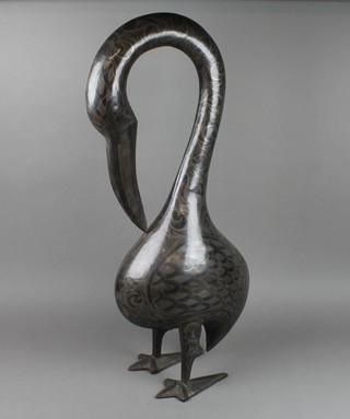 A bronze figure of a standing bird 27"h 