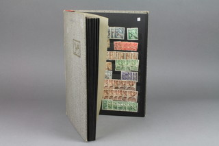 A stock book of Commonwealth stamps Victorian to early Elizabeth II including Malta, Bermuda, Ceylon, mint and used