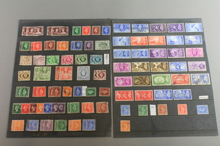 2 sheets of GB mint and used stamps George VI stamps including inverted and sideways, approx 111 stamps