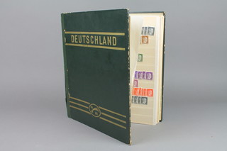 A red stock book of various world stamps