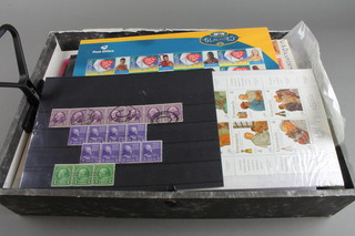 A box of various presentation first day covers and world stamps etc