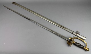 A Belgian sword with 35" etched blade, horn grip, complete with polished scabbard