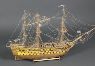 A wooden model of a 3 masted galleon 25"h x 39"w