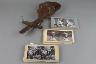 A Perfectscope stereoscopic viewer together with approx. 33 stereoscopic slides
