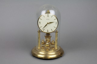 A 400 day clock complete with glass dome by Bentima