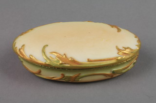 A Royal Worcester blush porcelain oval trinket box with scroll decoration 1571 4.5"