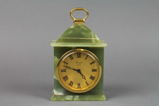 A timepiece with gilt dial and Roman numerals contained in a green onyx case, the dial marked Balmoral of London 