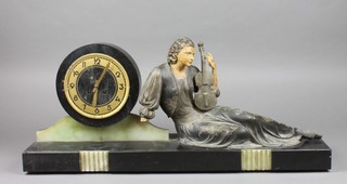 An Art Deco onyx and black marble mantel timepiece flanked by a seated female musician, signed Menneville 28" 