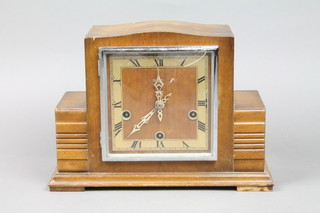 An Art Deco chiming mantel clock with square dial contained in a walnut case by Smiths 