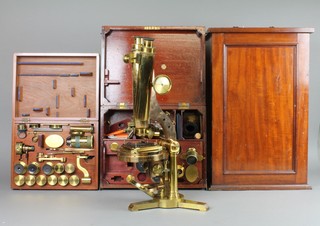 R & J Beck London, a 19th Century brass binocular microscope by R J Beck No.6308 contained in a well fitted mahogany case enclosing a cased set of accessories/lenses, together with a mahogany box with hinged lid containing additional lenses and accessories