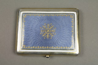 An early 20th Century Continental silver gilt and guilloche enamel cigarette case with cabouchon set thumb piece, 3.5" 