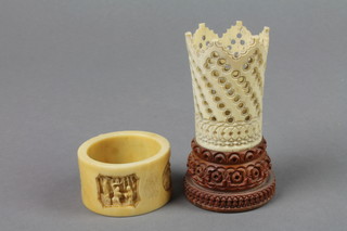 A Catonese carved ivory napkin ring and a ditto vase with pierced decoration 