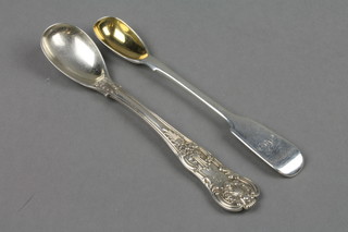 A William IV silver Kings pattern mustard spoon, London 1835, a Victorian fiddle pattern ditto