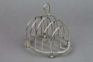 A stylish Victorian silver 5 bar toast rack on turned feet, London 1862 5" 