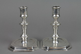 A pair of Georgian design silver candlesticks on turned form and octagonal base, London 1939 5", approx 20.6 ozs 