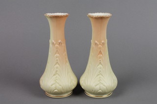 A pair of Worcester Locke & Co oviform vases with leaf decoration 7"