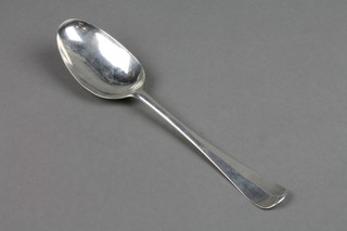 A George I silver table spoon with rat tail back, engraved and monogrammed