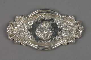 A modern repousse silver pin tray decorated with flowers, London 1990 4"