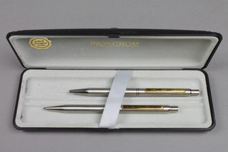An Inoxcrom ball point pen together with a propelling pencil
