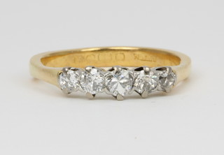 An 18ct five stone graduated diamond ring