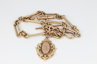 A 9ct gold watch chain with T bar and 9ct sports rob, approx 51.5grams