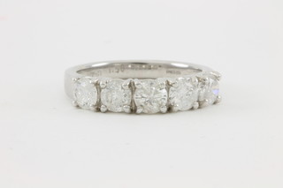 An 18ct white gold claw set 5 stone diamond ring, approx 1.50ct
