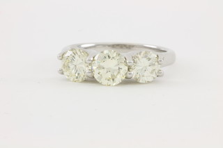 An 18ct white gold claw set 3 stone diamond ring, approx 2.33ct