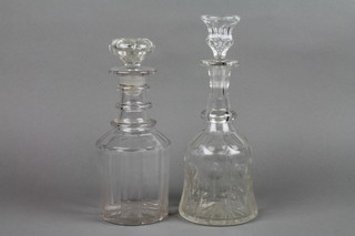 2 19th Century mallet shaped glass decanter and stoppers