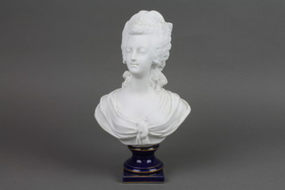 A 19th Century bisque bust of a French lady on a blue and gilt socle 10"