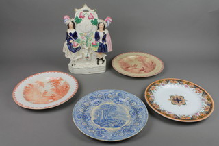 A 19th Century Staffordshire figure group standing beside a clock 14" and 4 19th Century plates