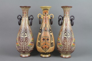 3 20th Century oviform vases with drop ring handles decorated with tribal studies 14"