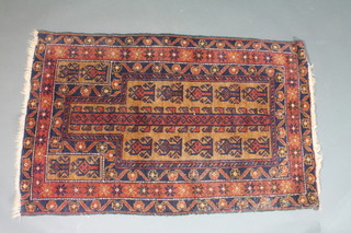 A Persian black and brown ground prayer rug with Mihrab 53" x 34"