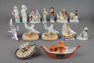 A collection of 1930's and other china figures